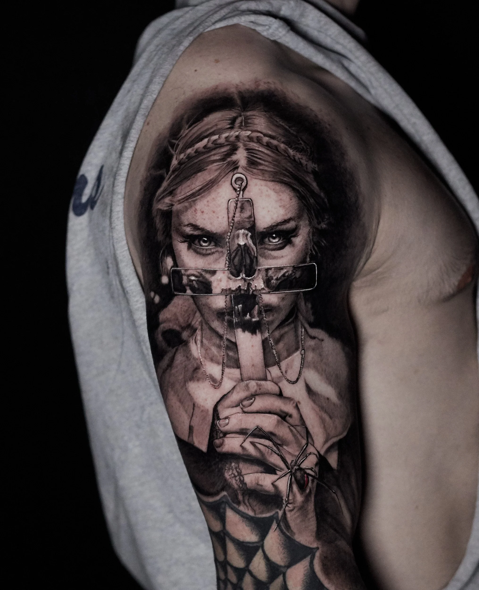 girl-and-cross-black-and-grey-realism-portrait-tattoo.jpg