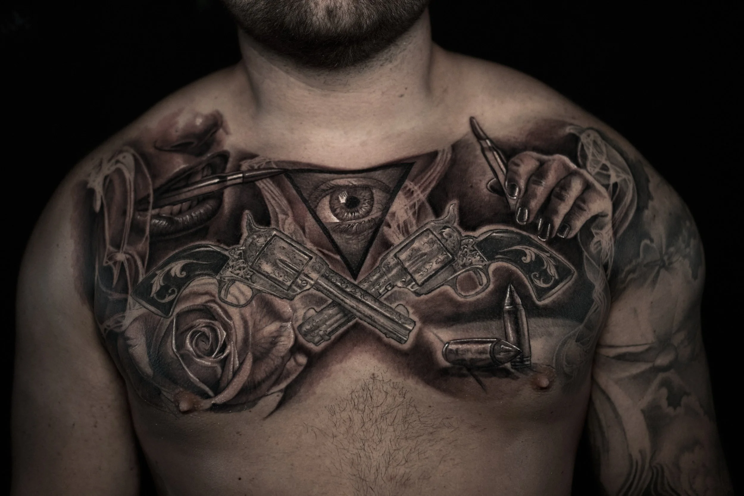 black-and-grey-realism-chest-piece-tattoo.jpg