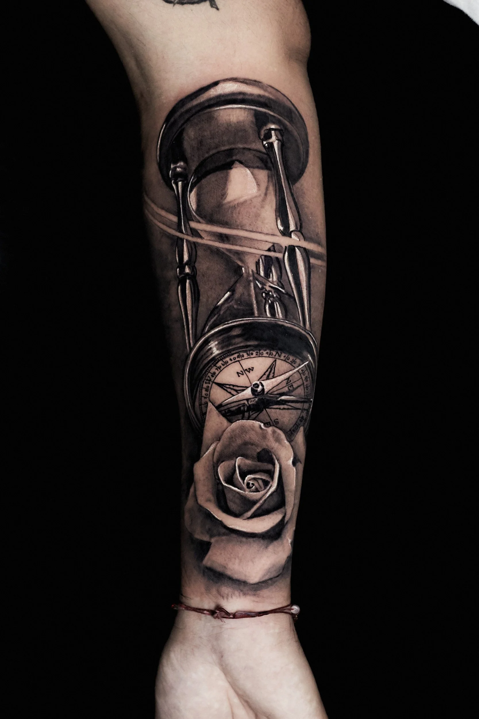 hourglass-and-rose-tattoo-realism-black-and-grey.jpg