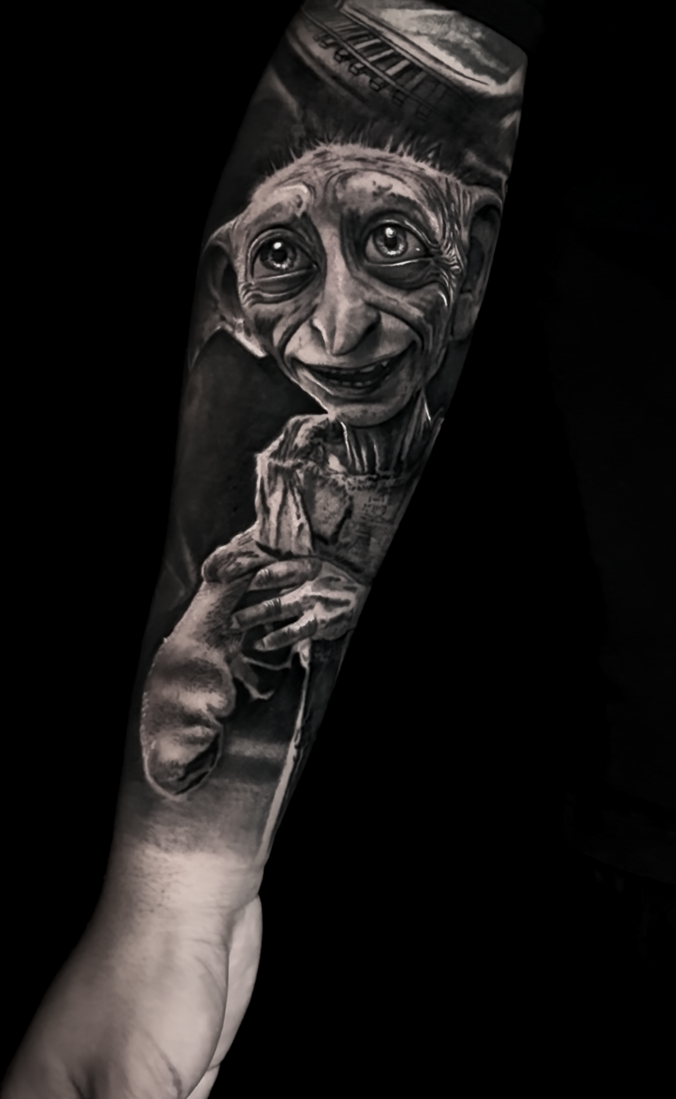 doby-harry-potter-sleeve-black-and-grey-realism-tattoo.png