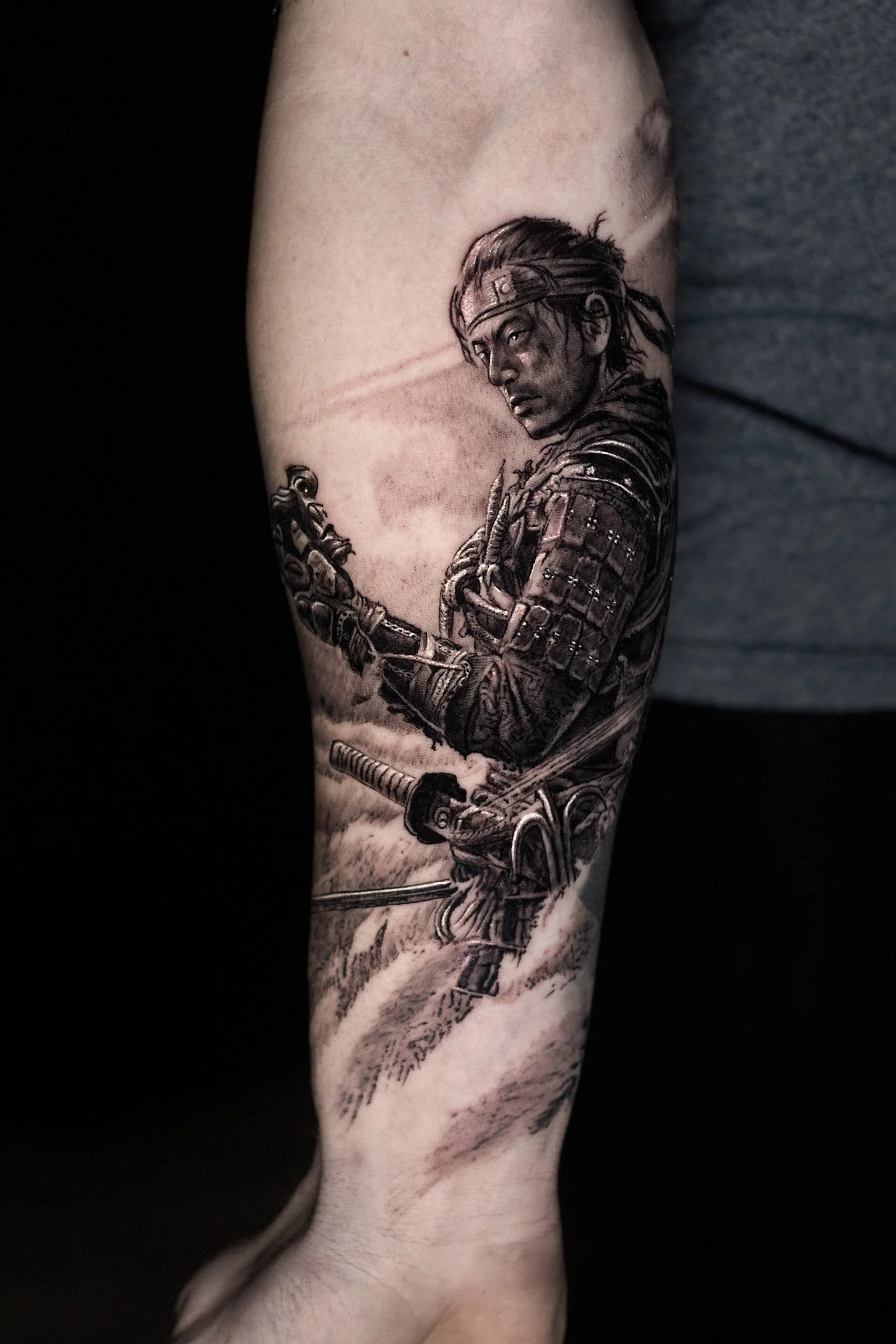 ghost-of-tsushima-tattoo-realism-black-and-grey.jpg