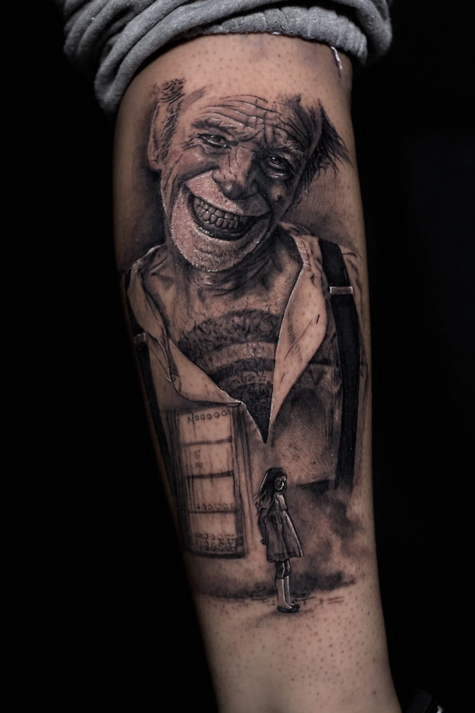 portrait-black-and-grey-realism-clown-tattoo.jpg