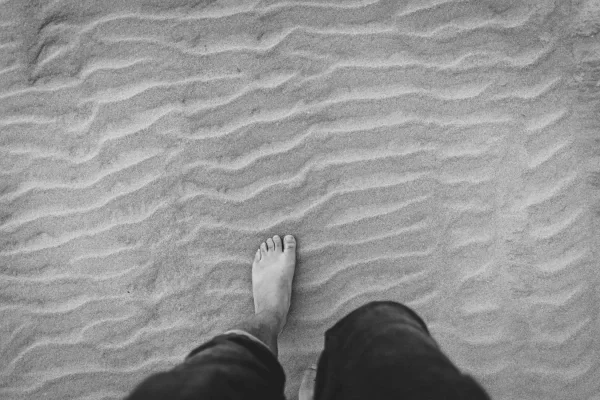 walking barefoot on the sand for grounding