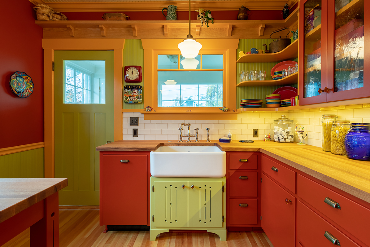  Beadboard walls behind face-framed cabinets, with ¾ inch overlay on the doors, add to the vintage appeal.           