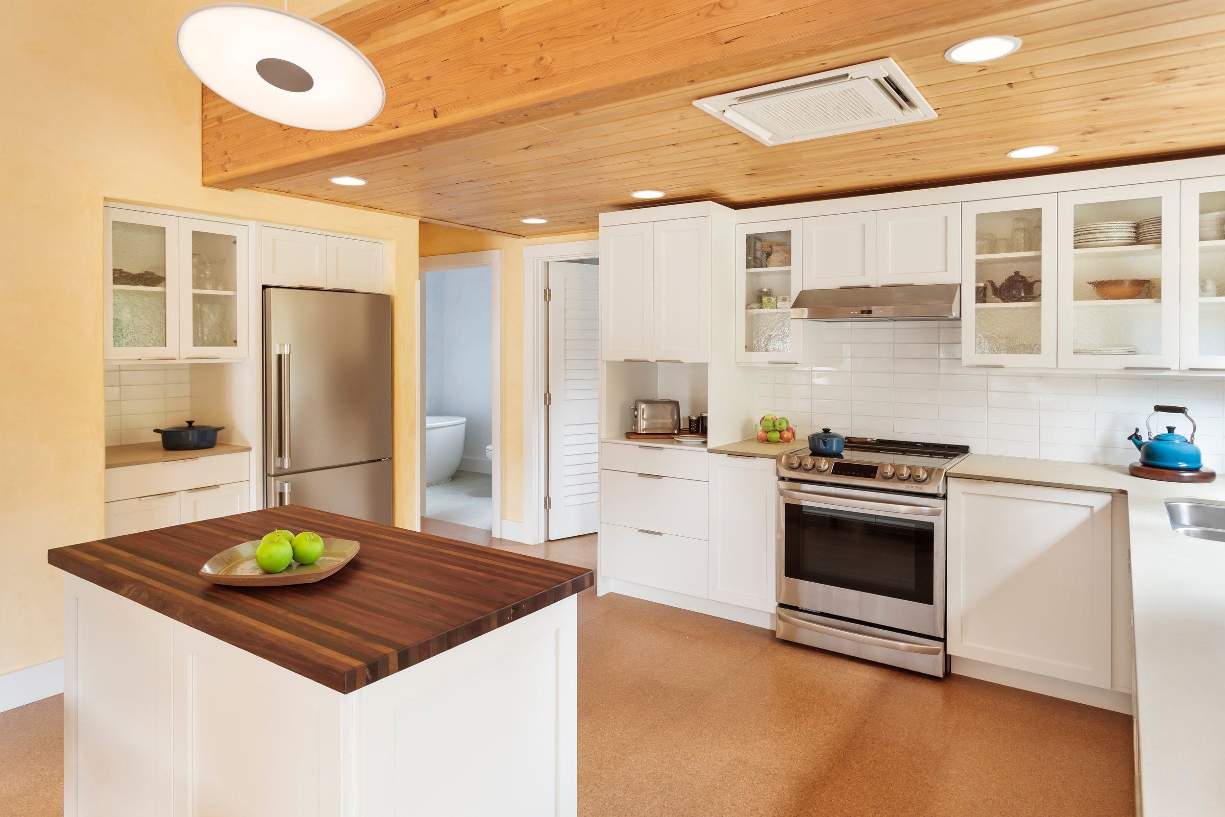 The kitchen island incorporates wood collected from Wheatley’s travels.