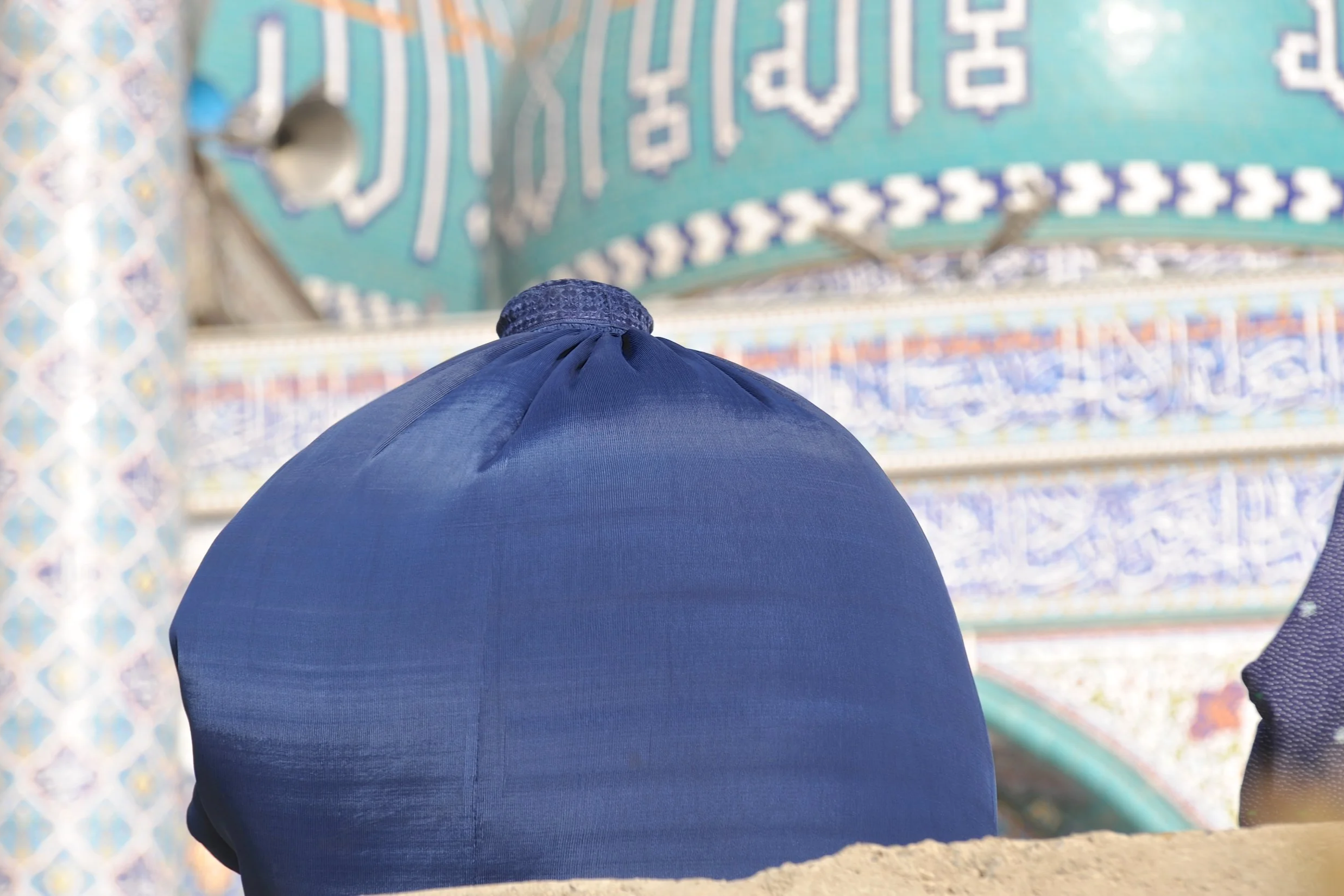 Praying in front of the mosque
