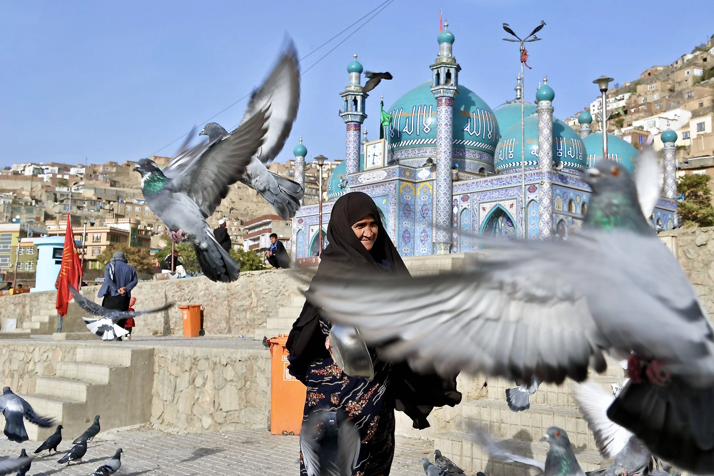 Woman with pigeons