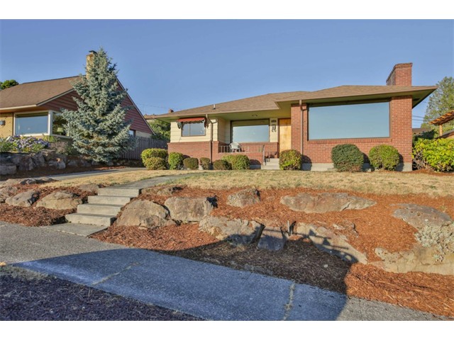 Buying: 9102 40th Ave SW, Seattle | List Price: $550,000 | Sold Price: $560,000