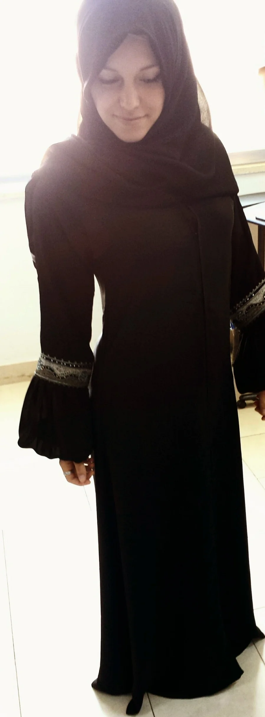 Playing dress up with my Muslim teacher in Jordan.