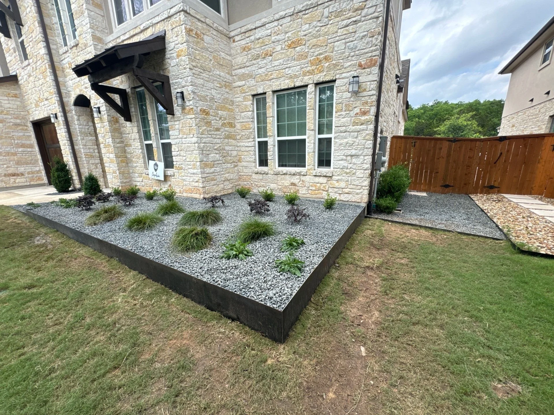 Welded Steel Planter with Irrigation and Plants.jpg