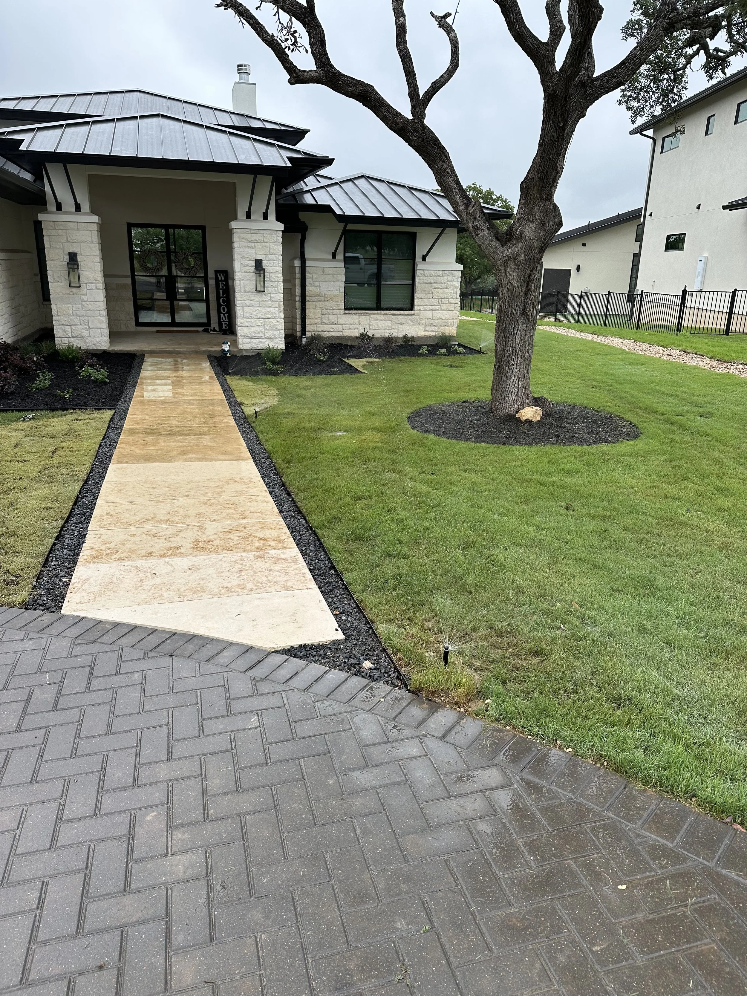 Paver Walkway with Irrigation and Sod.jpg