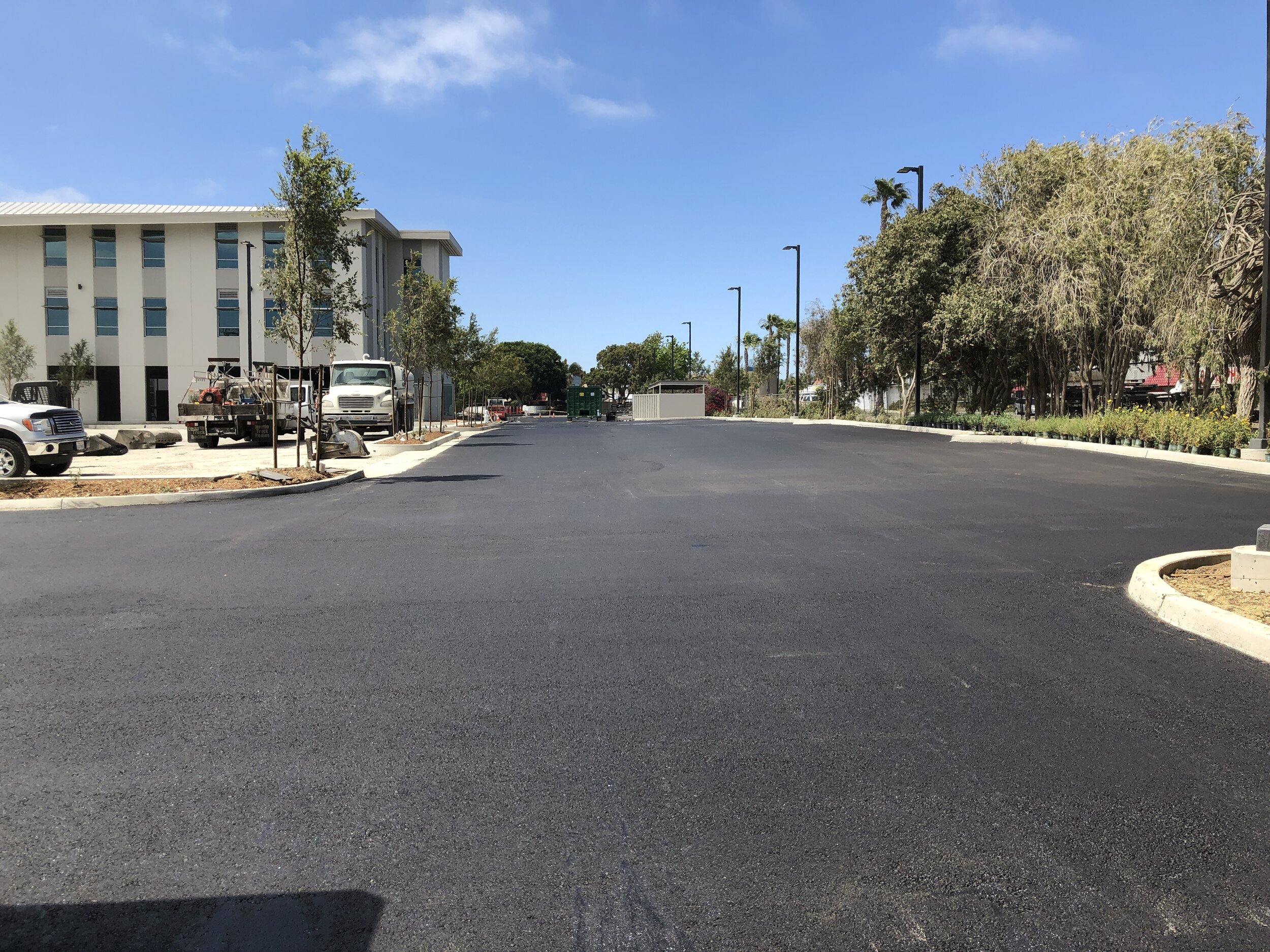  A freshly paved asphalt parking lot 