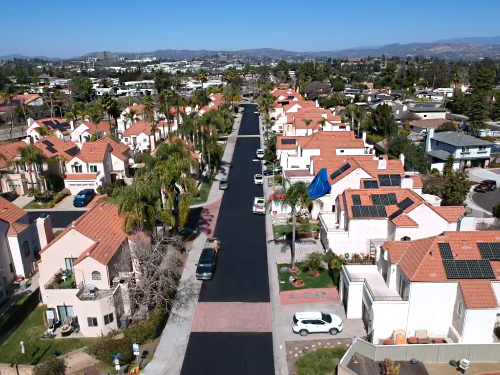  Aerial view of freshly sealed residential street 