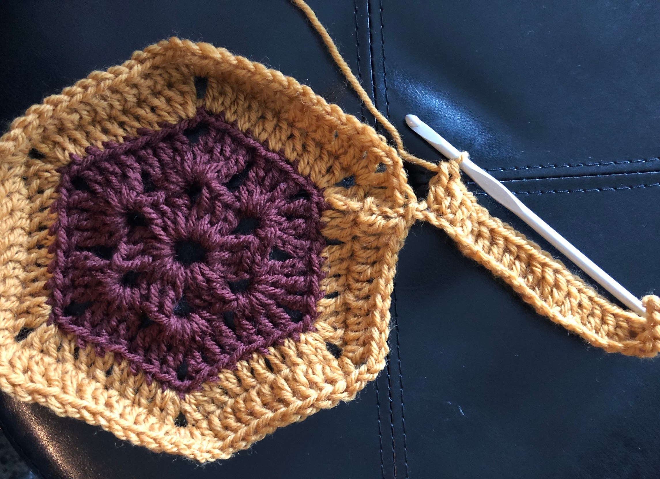 We’ve now worked all of the dc stitches up one side of the arm and are about to anchor the arm to the main motif.