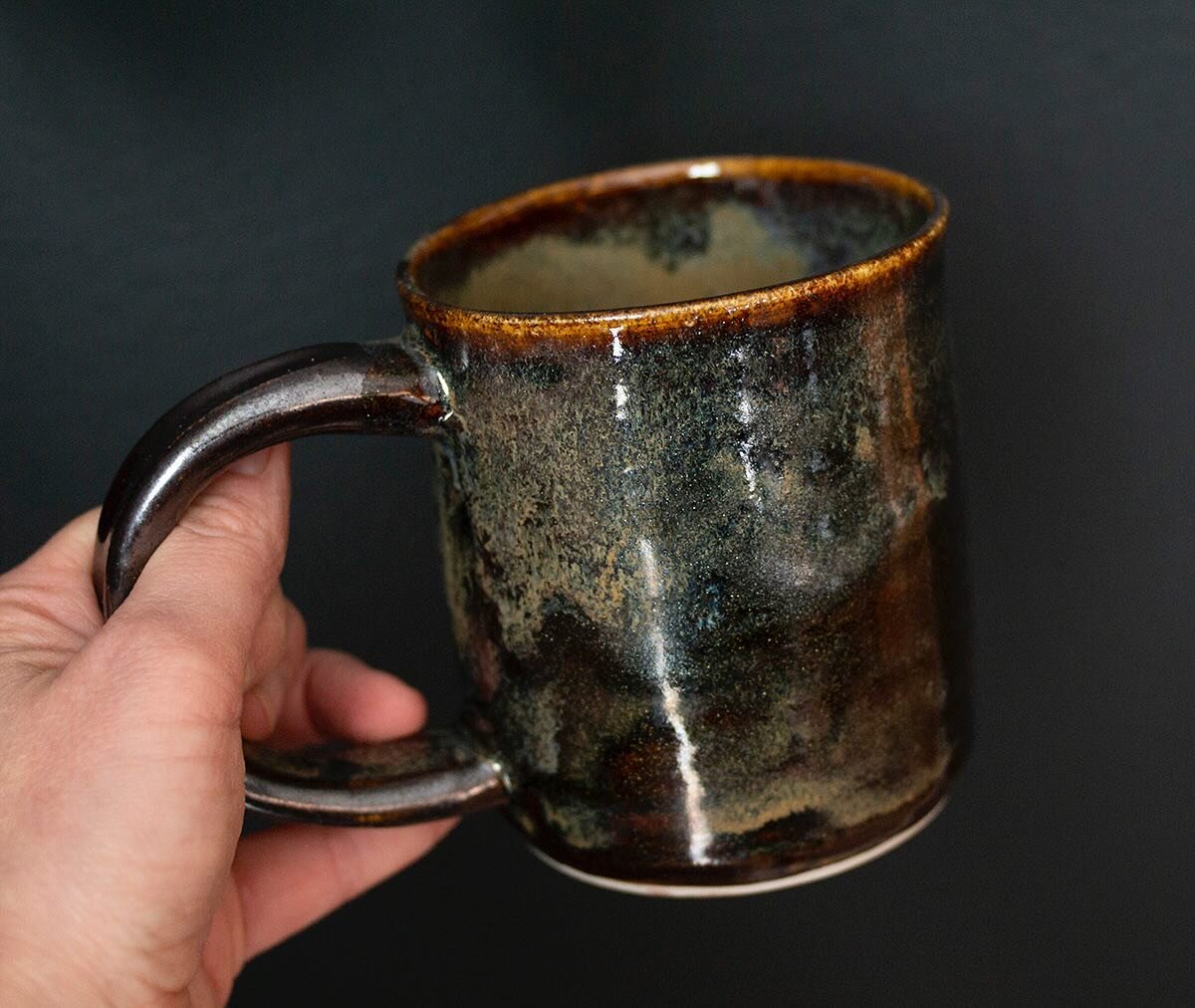 I call this one the Cosmic Mug. It&rsquo;s a bit sparkly ✨. Available now in my Etsy store #cosmic #throwingpots #coffeemug #sparkles