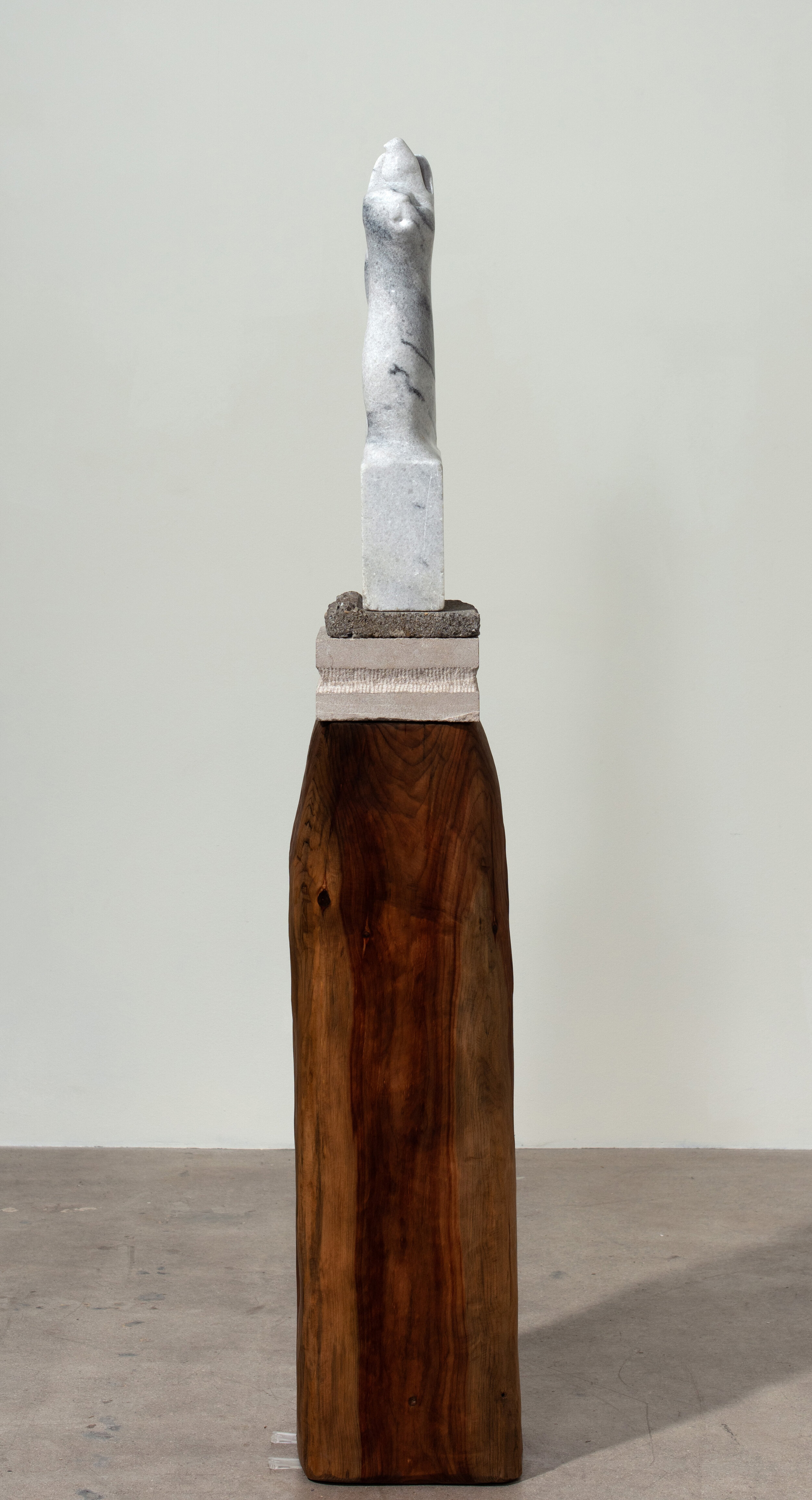   Singing Cat , 2020 Wood, marble, limestone, and concrete 63 1/2 x 10 x 10 inches 