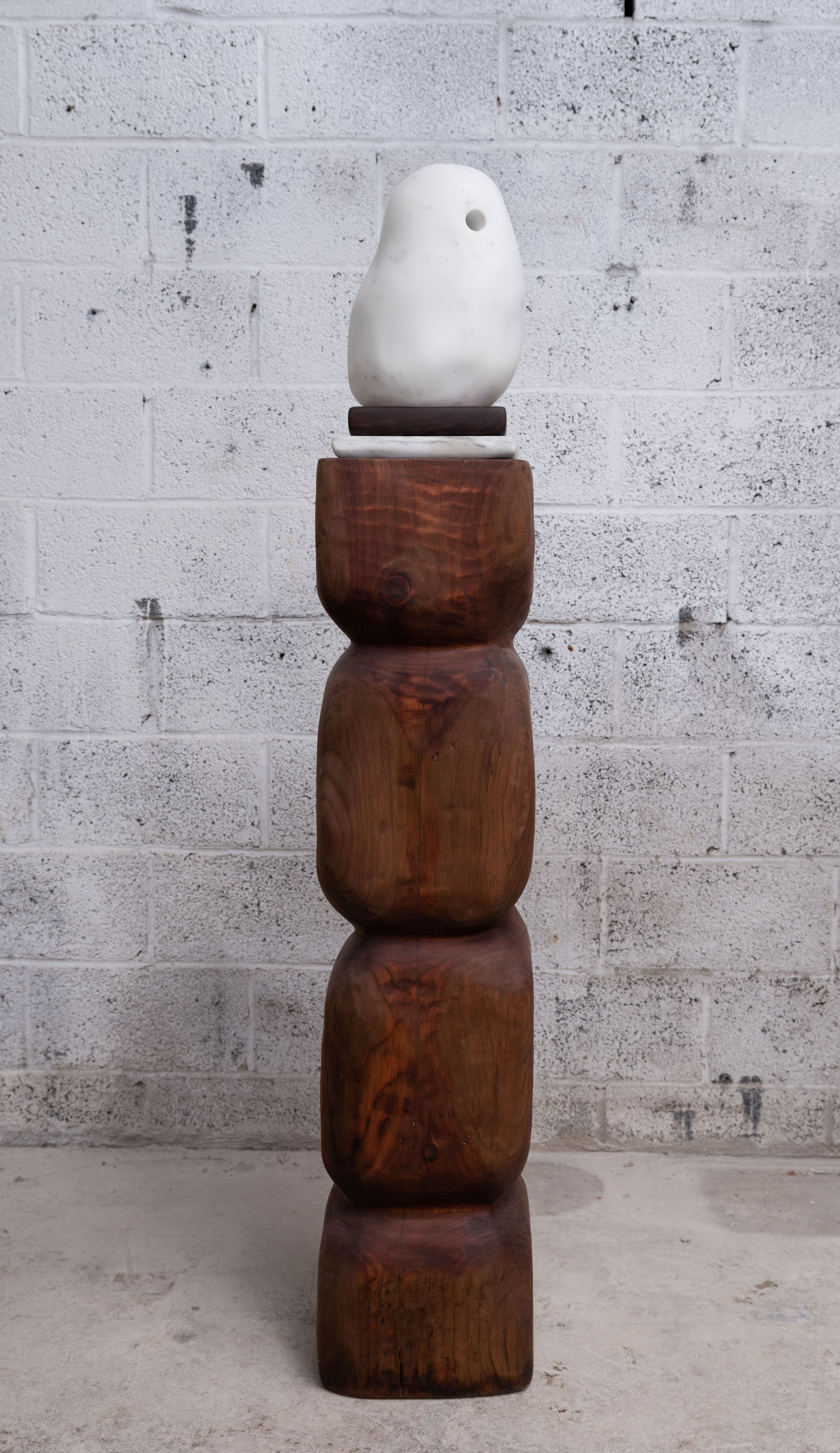   Egg Peace , 2023 Mixed marbles and wood 63 x 11 x 11 inches 