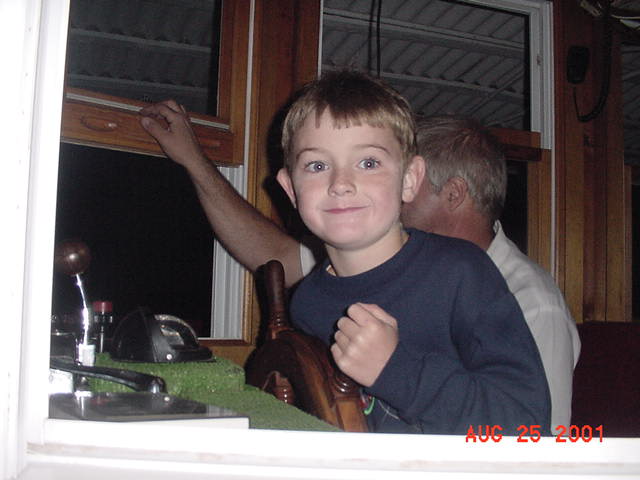 Michael at the wheel of the Songo River Queen