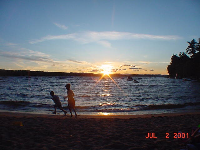 Michael and friend William on the beach at sunset.