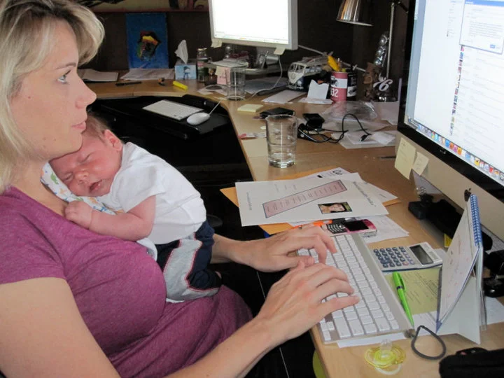 August 2010. Working my network marketing business with my 4 1/2 week old baby Ryan. 