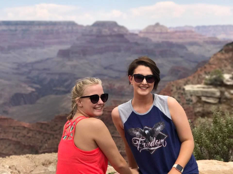 Shot of two daughters with canyon in the background.