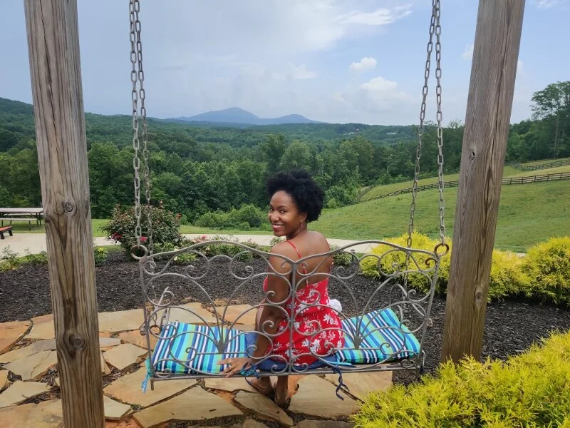 me-on-bench-at-winery.jpg