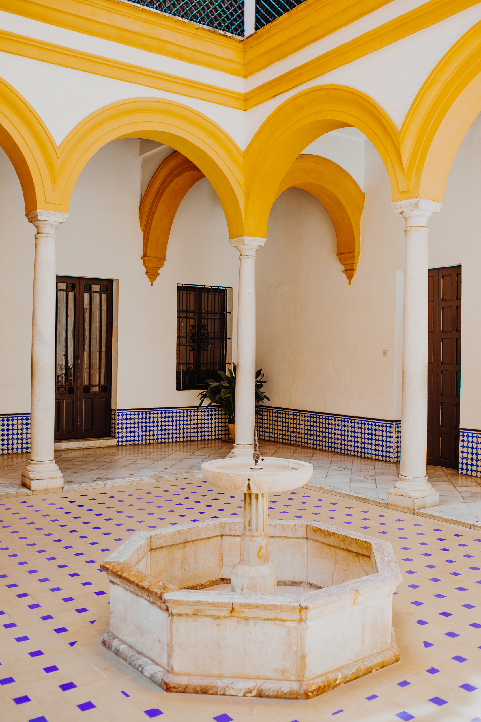 colorful-courtyard-royal-alcazar-seville-spain