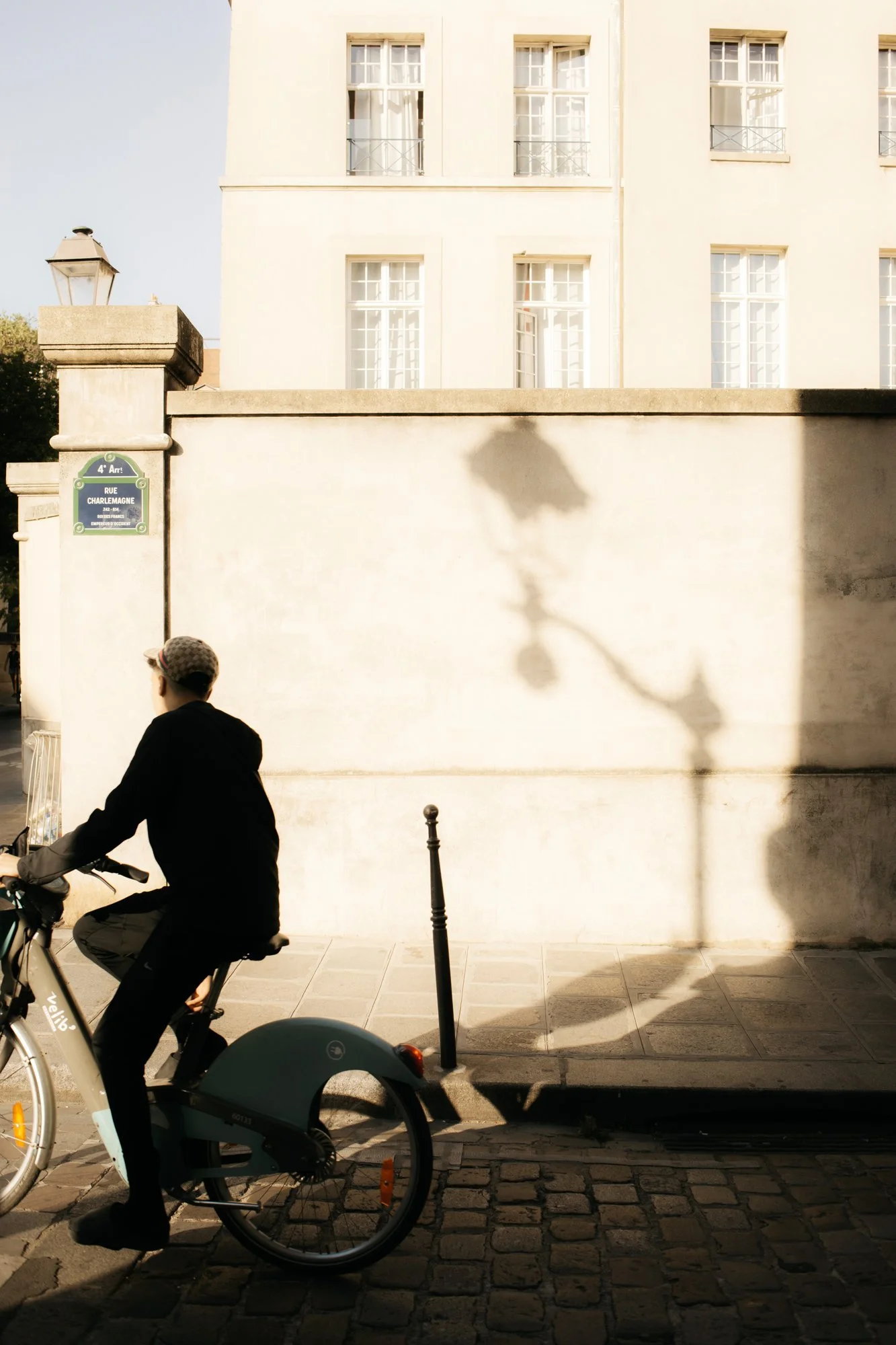 Cyclist in Paris' Le Marais Neighborhood