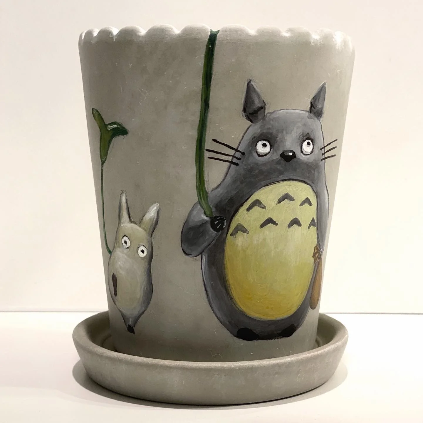  Totoro scene painted on a ceramic pot 
