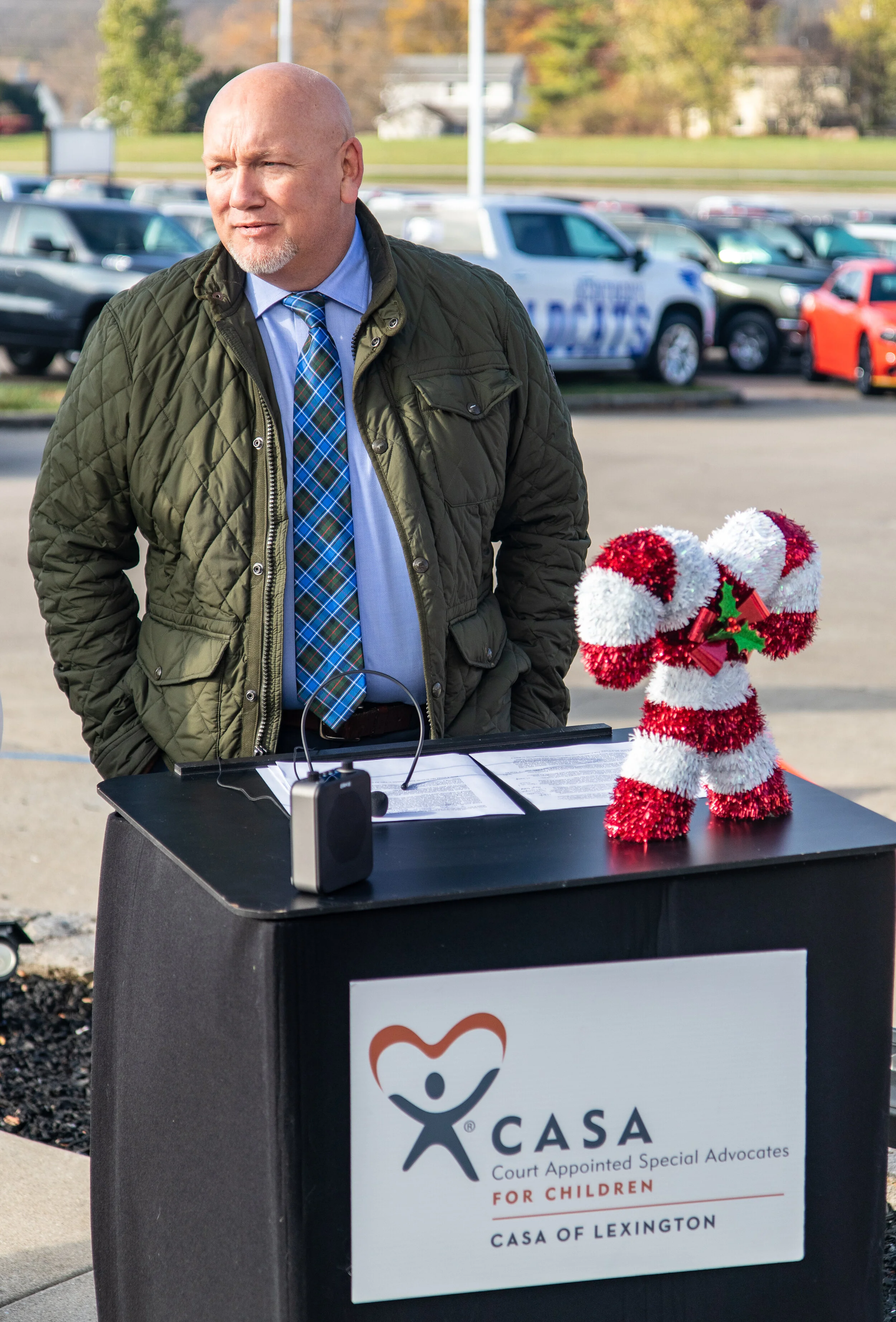 Scott County Judge-Executive Joe Pat Covington speaks at the Scott County CASA Angel Tree lighting event Thursday.