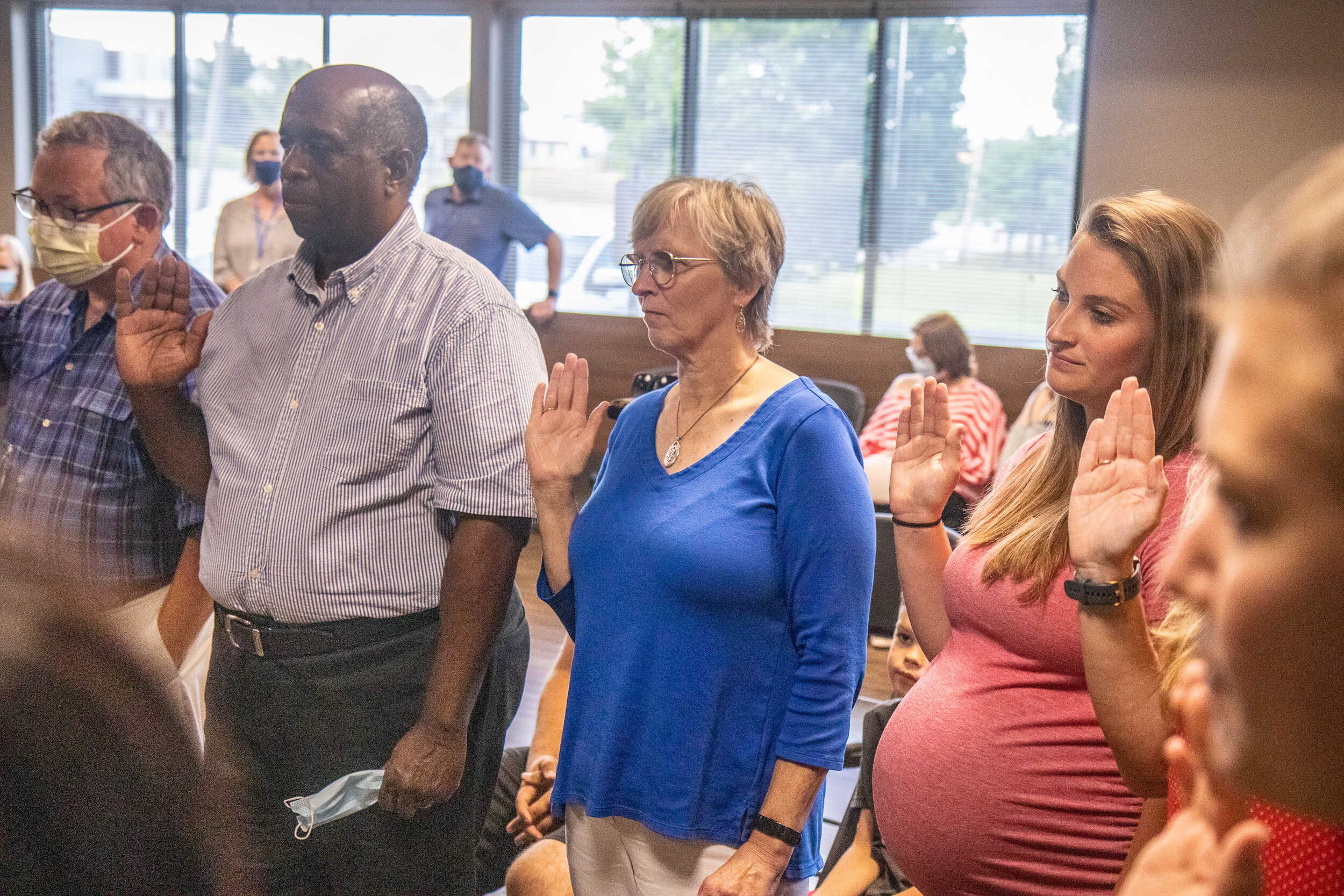 New CASA volunteers take an oath of confidentiality Aug. 3 after completing their 30-hour training course.