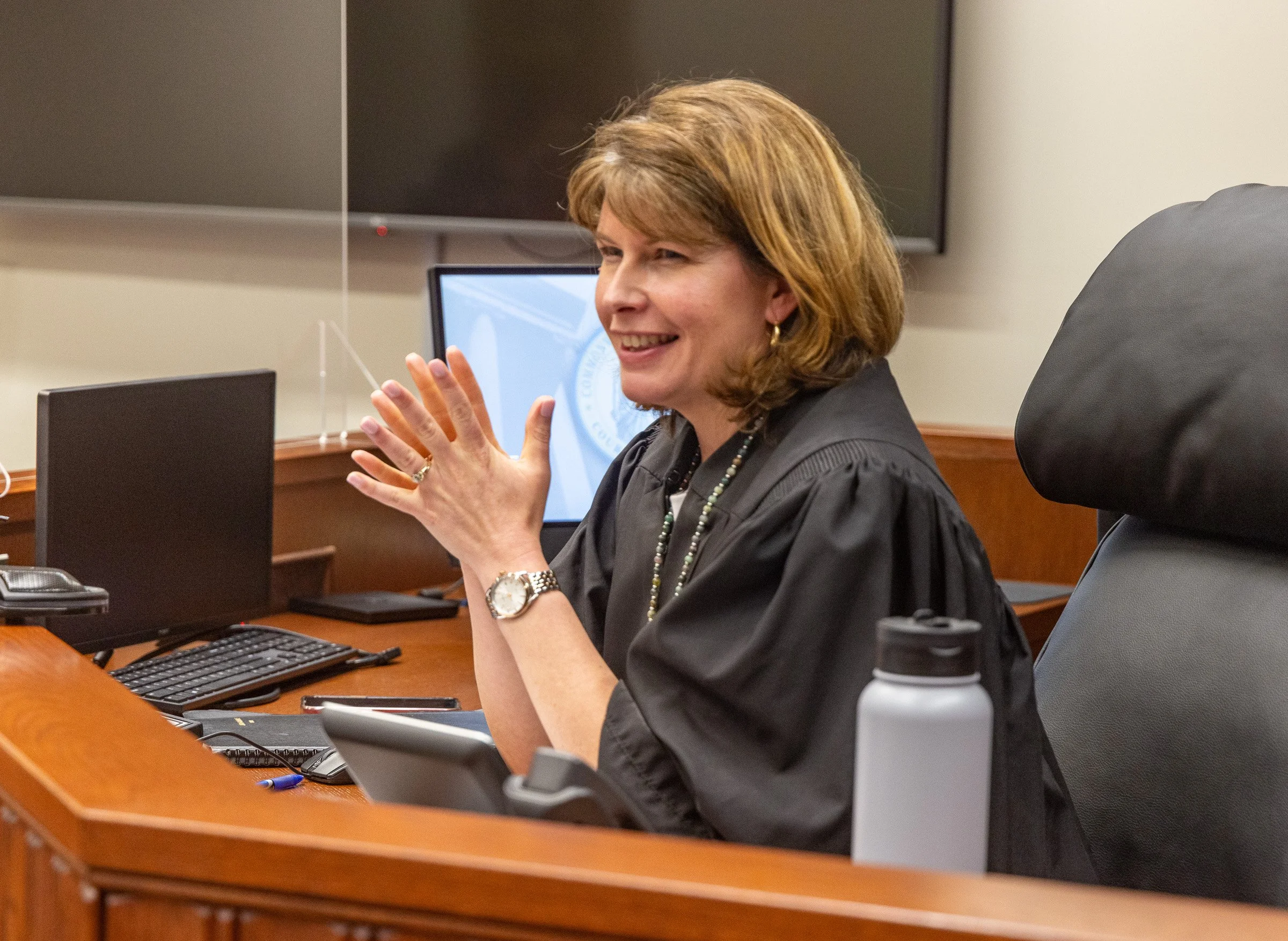 Fayette County Family Court Judge Tiffany Yahr speaks to new CASA volunteers during a swearing in ceremony at the circuit courthouse on June 30.