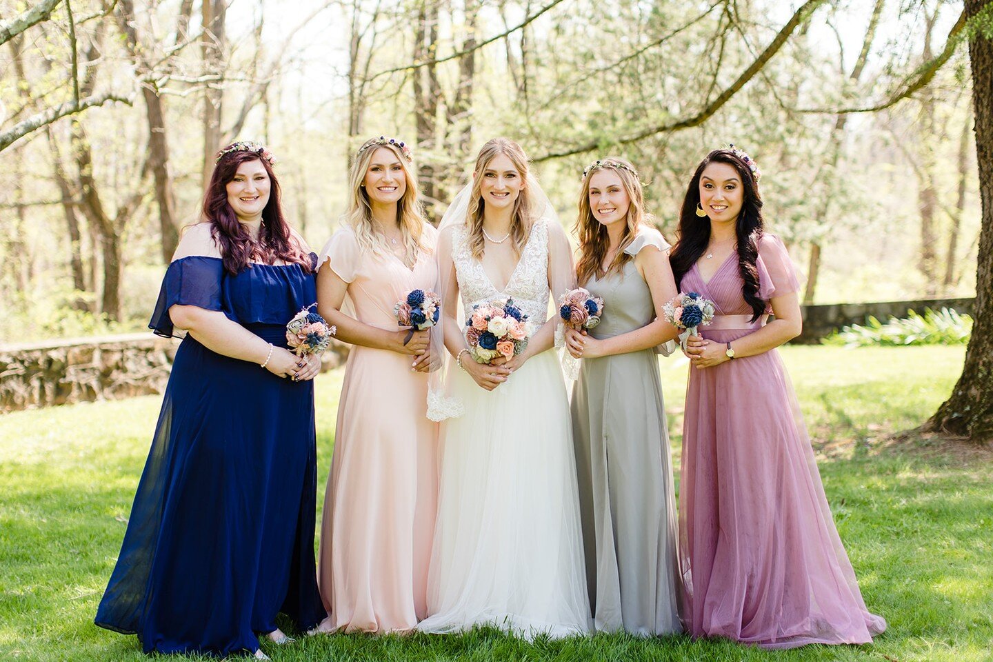 Janet and her beautiful bridal party | Love how they have different dresses yet everything comes together and looks goregous | Makeup by Sandra | #bridesmaidsinspiration 
Venue @rustmanorhouse 
Photo @meganreiphotography