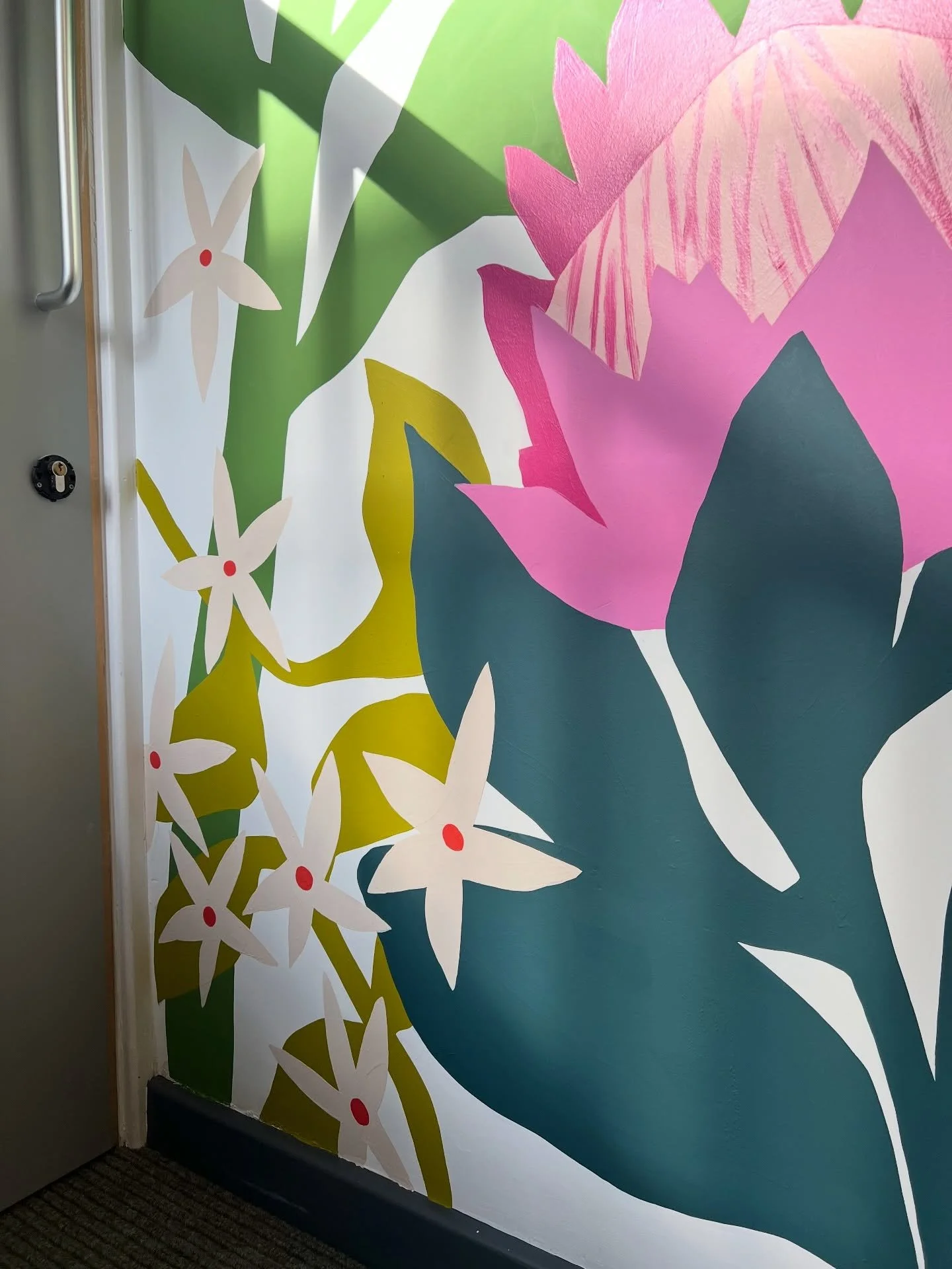 The brief for these two walls was to represent the school community through national flowers. Following a day of workshops I led with students and parents from across the year groups. Some of the different nations represented are: 
Afganistan: Tulip
