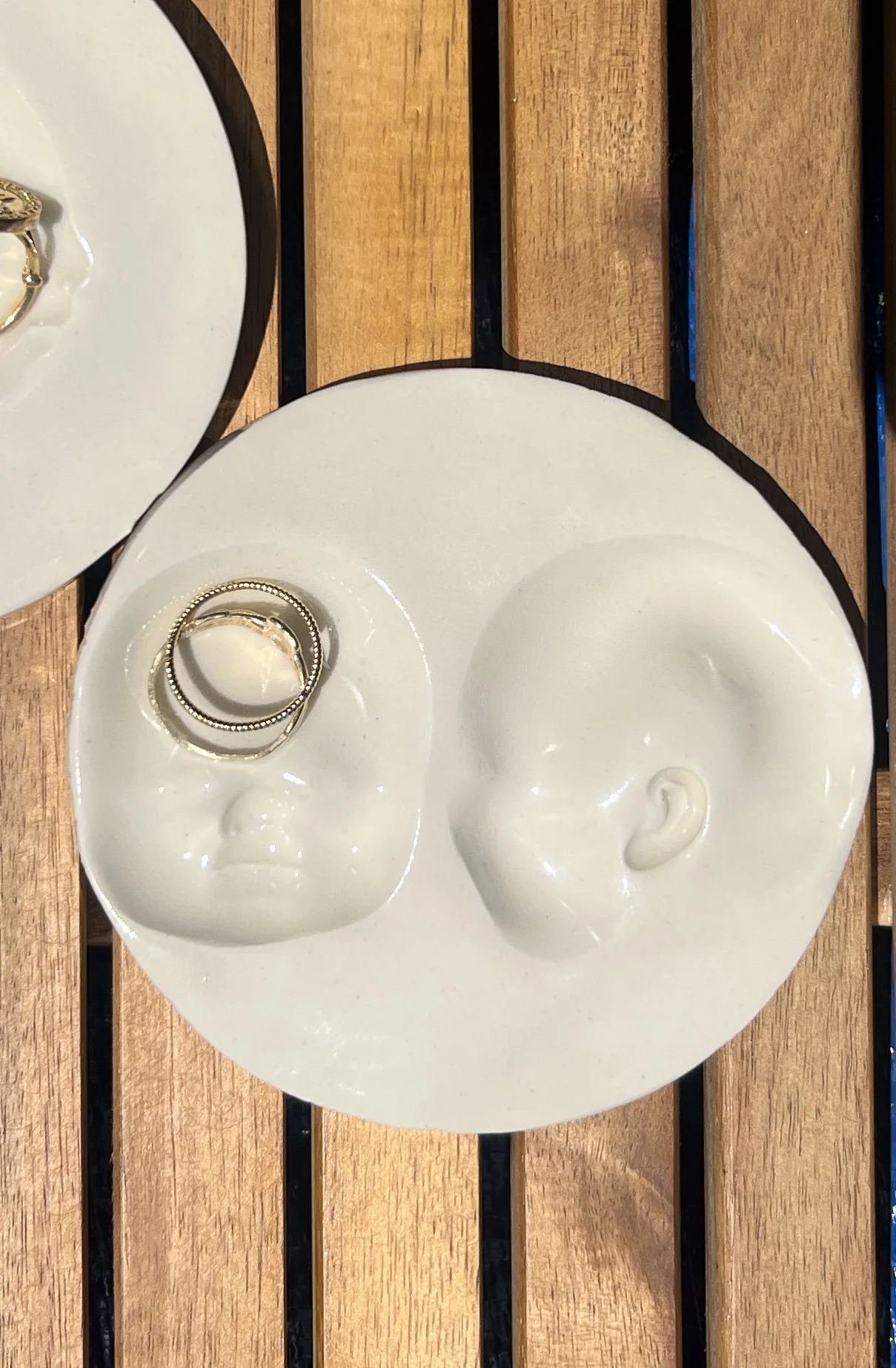 Baby face ring dishes detail