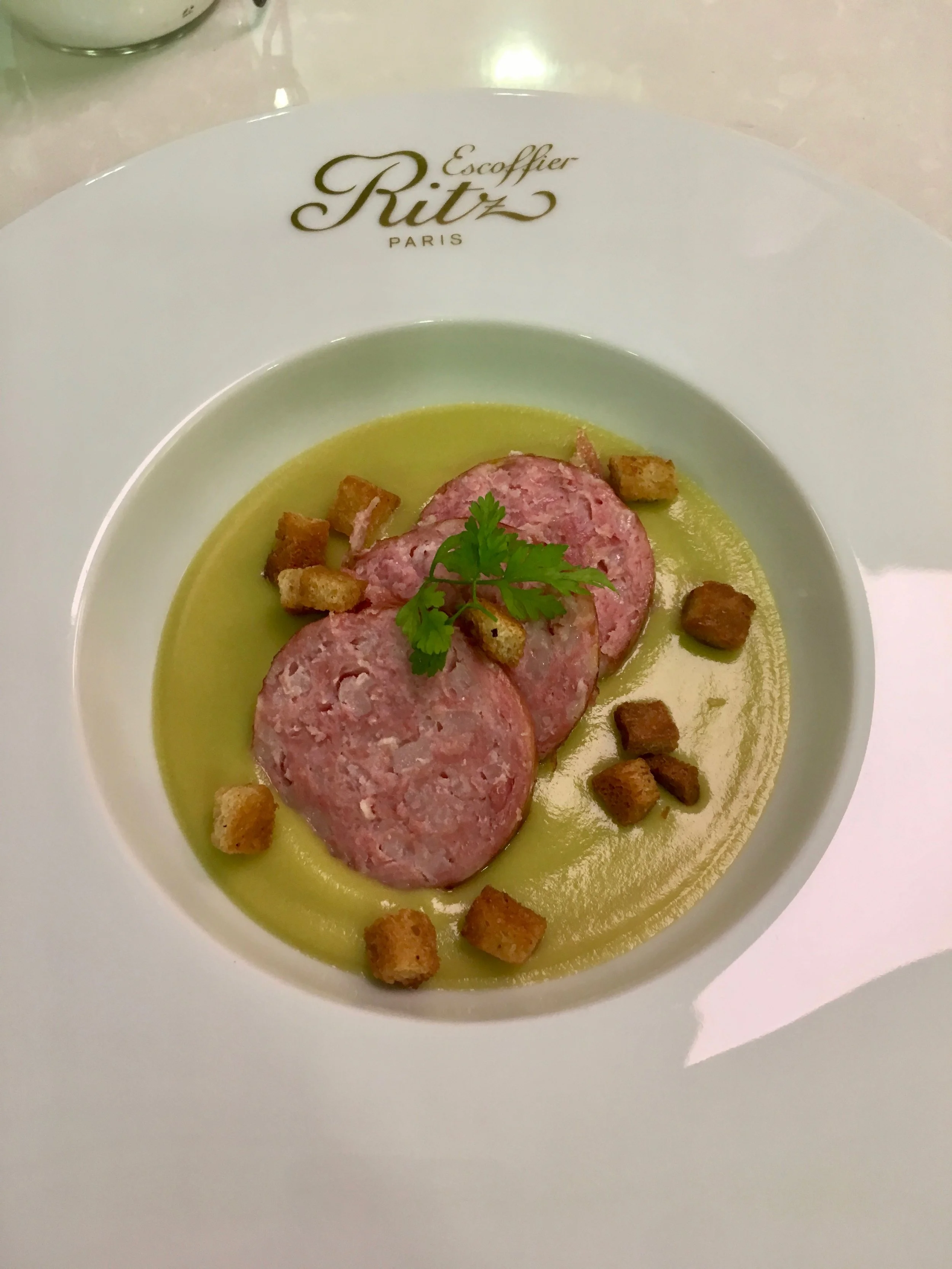 St-Germain (fresh pea) soup with sausage and croutons