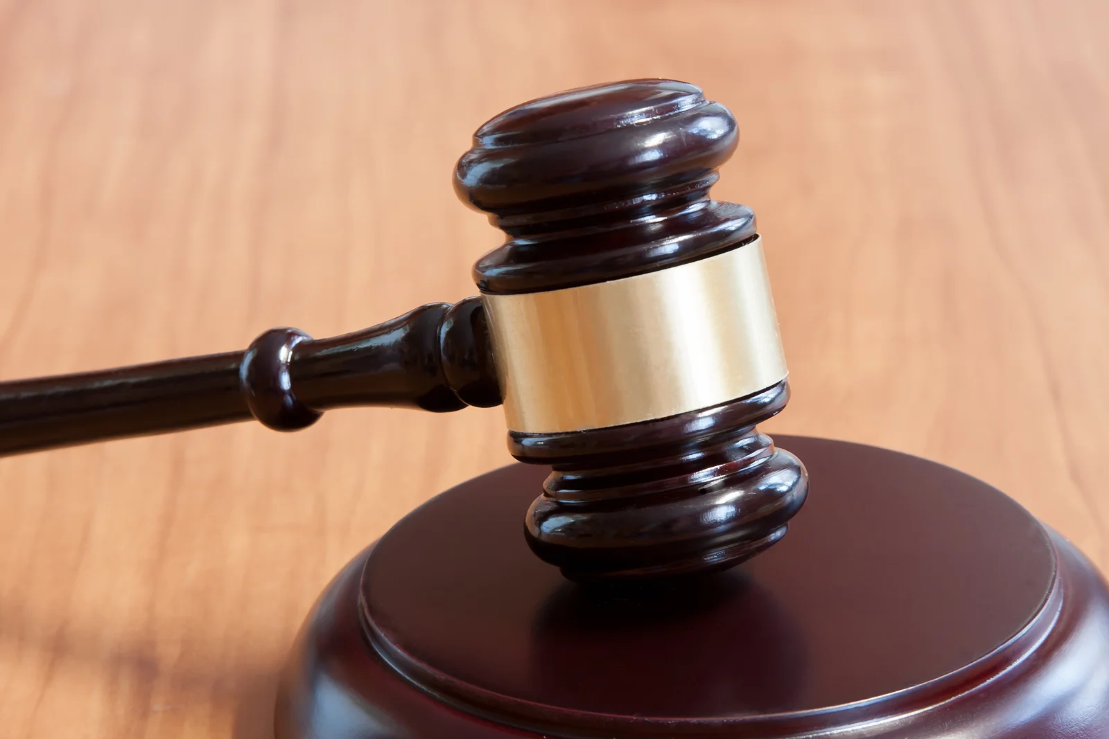 bigstock-Judicial-Hammer-On-A-Wooden-T-119911805.jpg