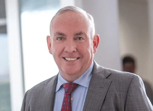 Brian Glackin ( Photo Source: The Livingston Group website)