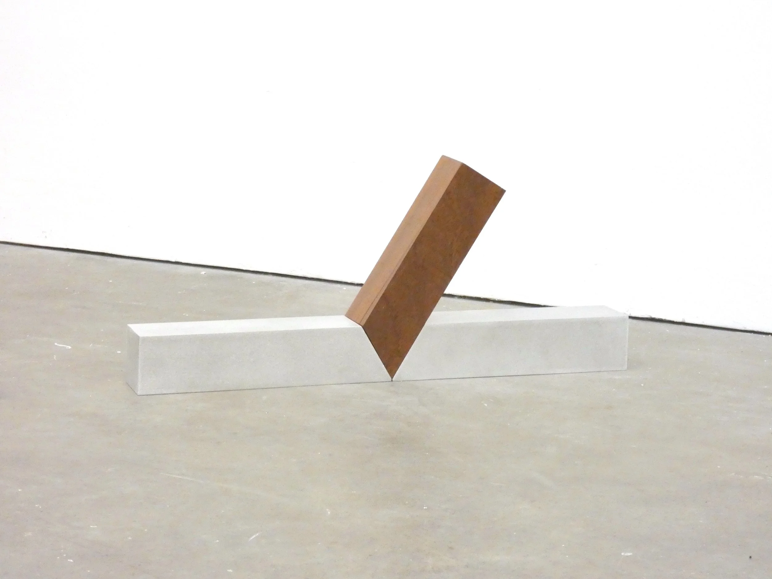    Split  (2022)  20 x 45 x 5.08 cm Sapele, aluminium square bar 