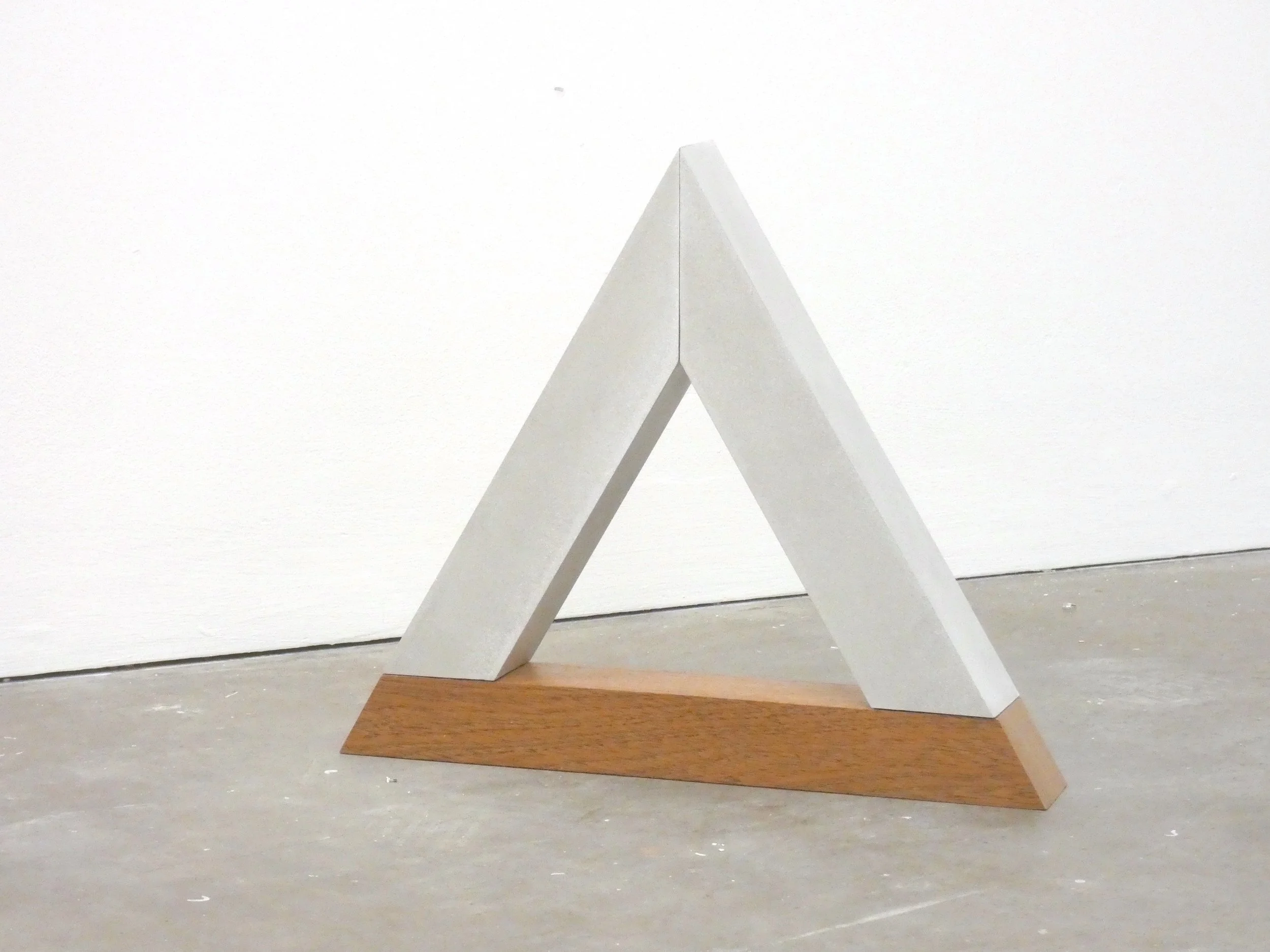    Triangle Relation  (2022)  30 x 35 x 5.08 cm Sapele, aluminium square bar 