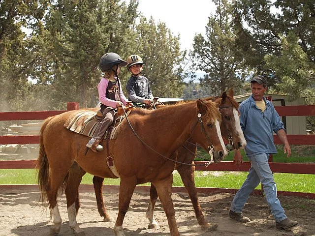 kids-with-kevin-on-horses.jpg