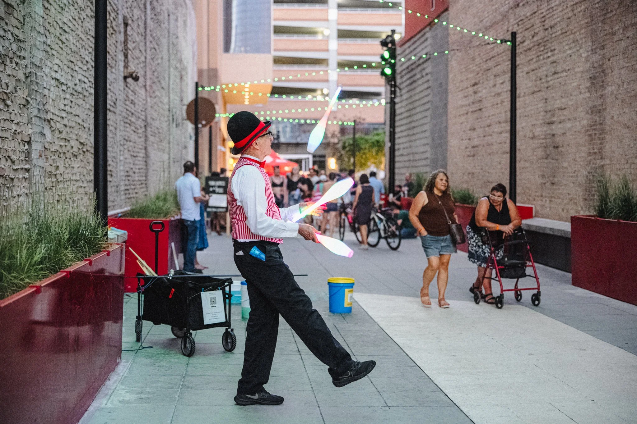 Juggler greets people at Busker Fest