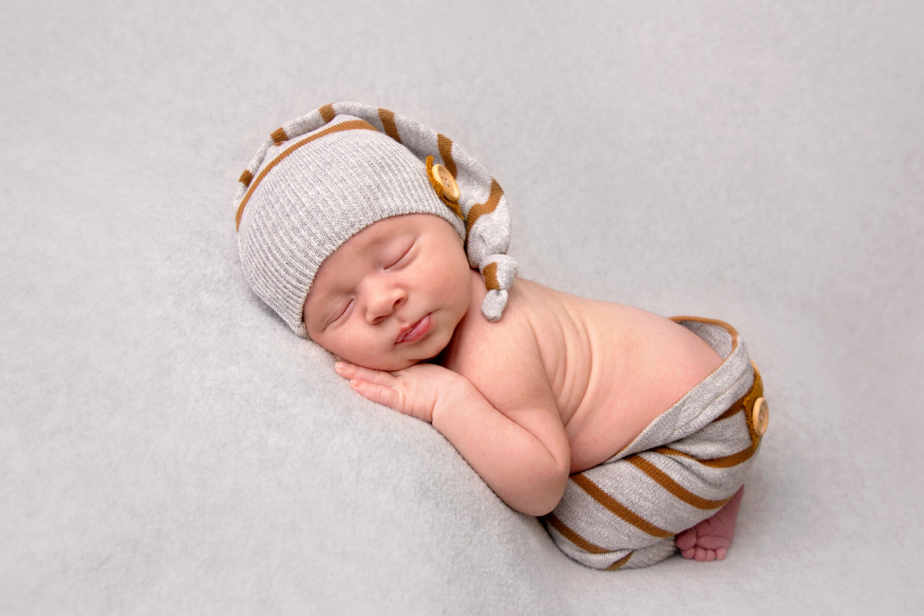 newborn-boy-striped-hat-pants.jpg