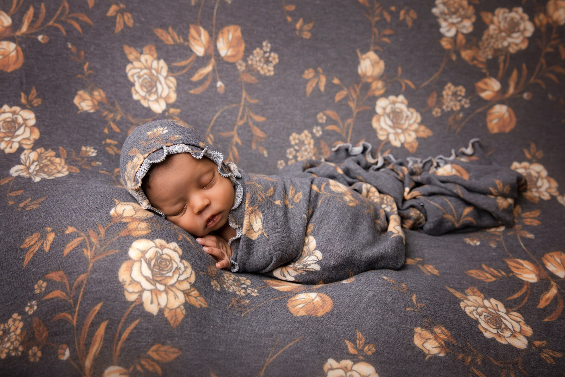 newborn-baby-girl-floral-blanket.jpg