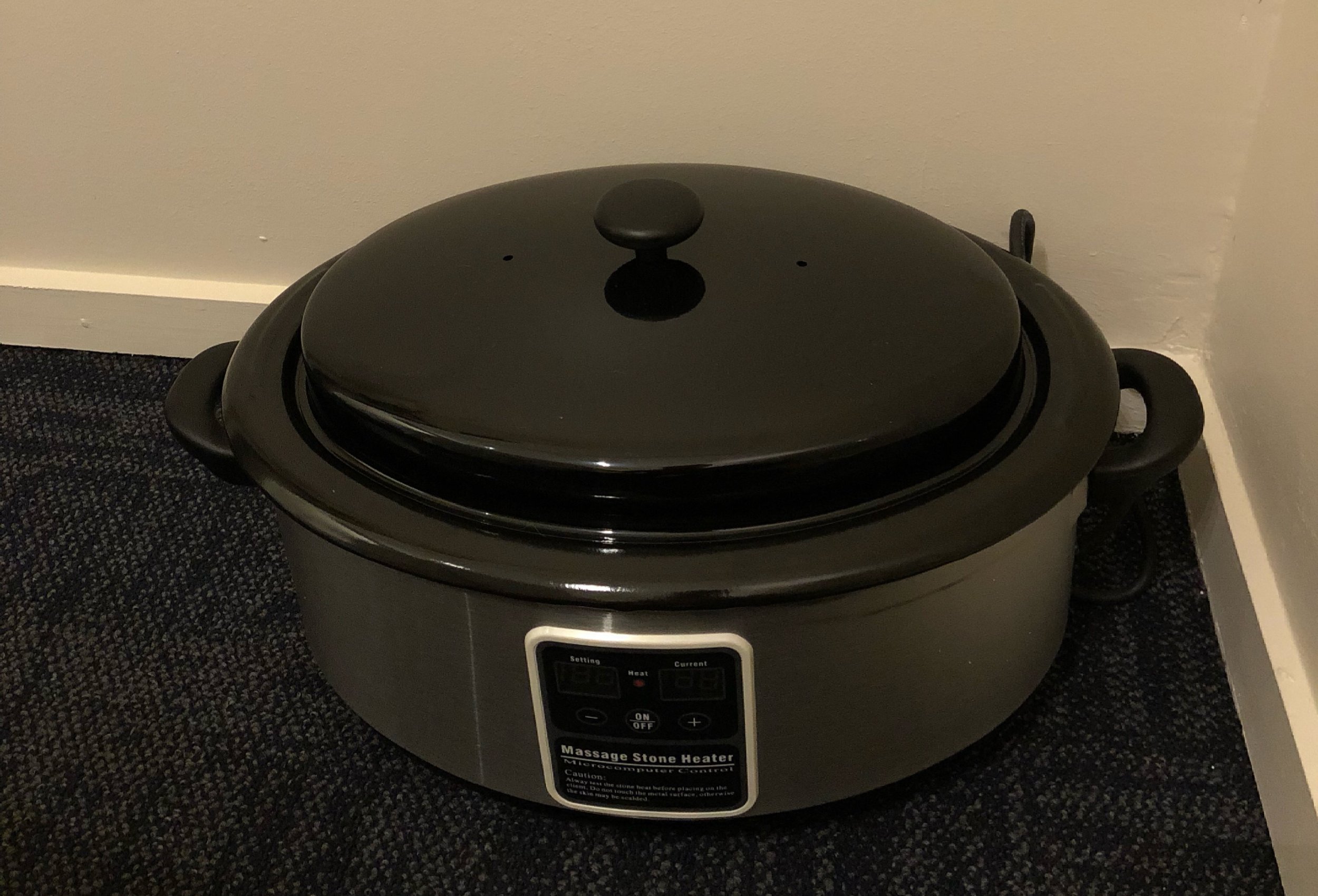 Hot stone warmer