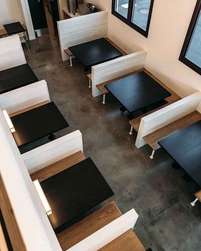 [ Tables ]

Beautiful black bowling alley tables. 
Reclaimed and stained. 
A brand new life in a restaurant. 
Who could ever have imagined they would end up here? So fun. 
And contrasting light benches with steel powder coated legs. Modern but homey.