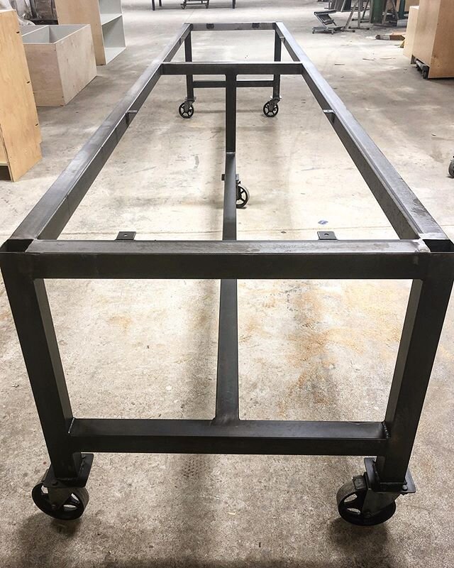 [ Conference Table ] 
Huge square tubular steel conference table base. Neatly welded and ready for it&rsquo;s 16ft bowling alley top. 
It is a good season to prepare for that wonderful time coming soon, when we will all be free to meet again.