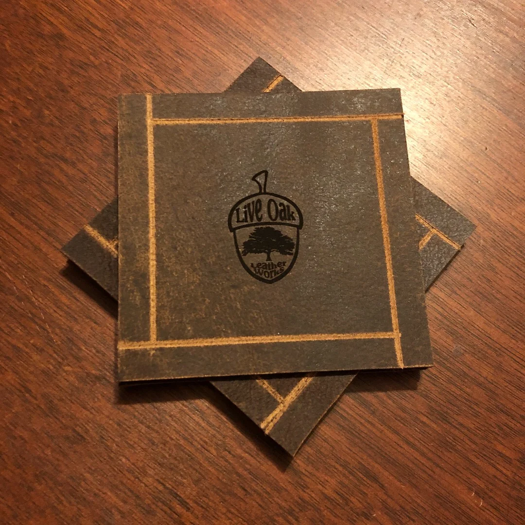 Set of four leather coasters