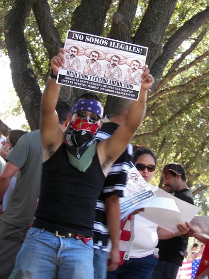 Irving Rally_protestor w sign.jpg