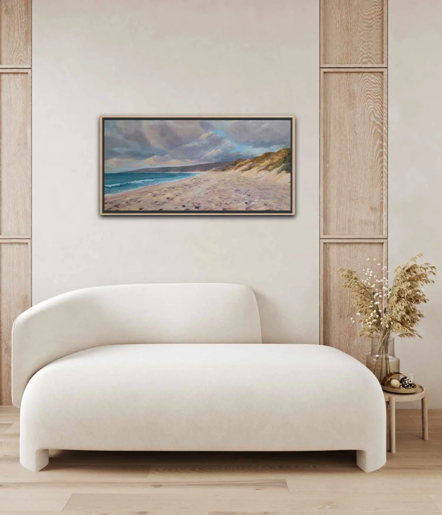 So will I insitu above a modern white curved couch.webp